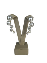 Brinco perolas dourado